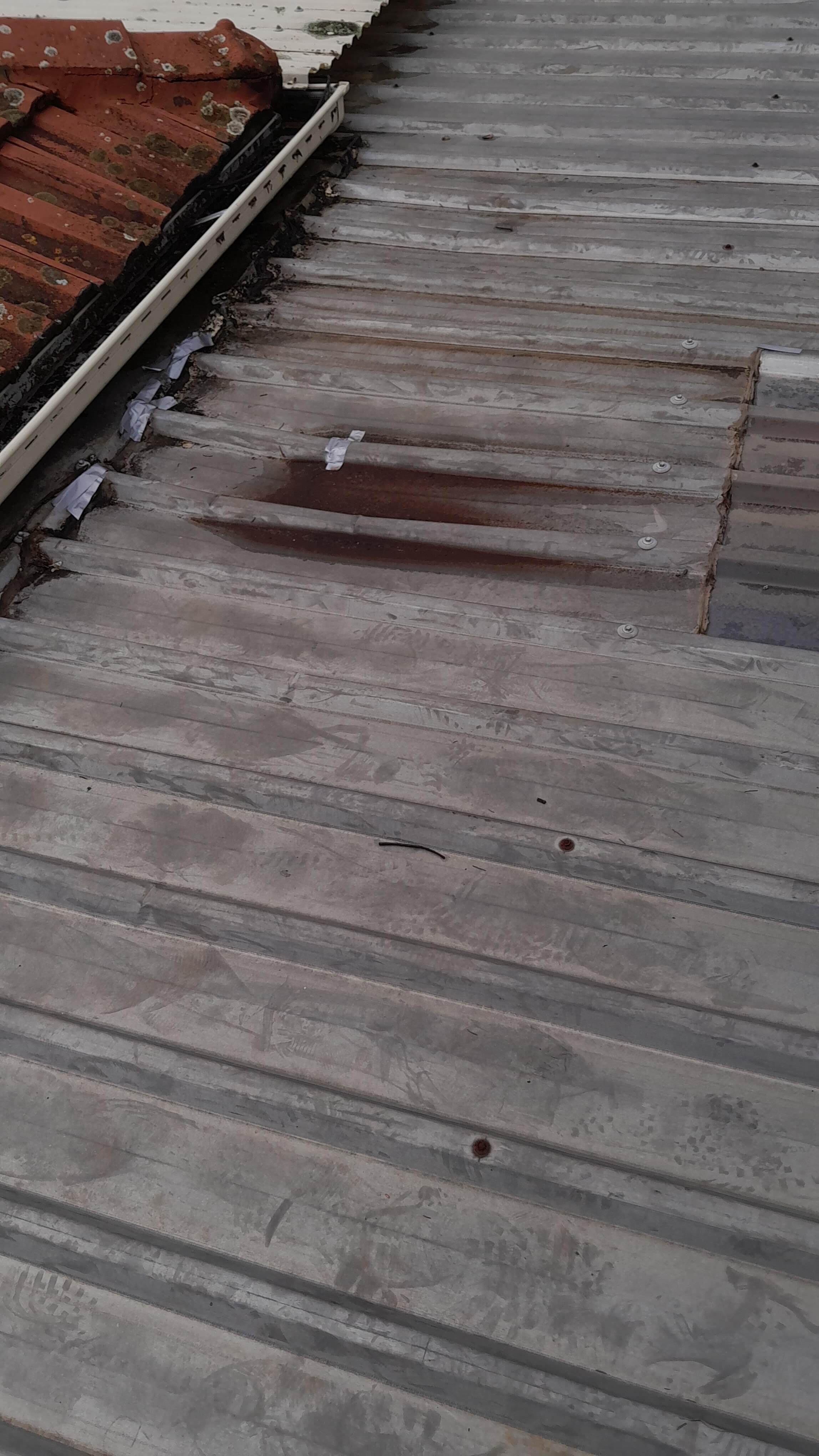Replace leaking garage roof sheet Scoresby 1